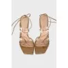 Gold lace-up sandals