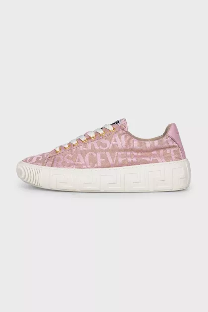Pink sneakers with a signature print