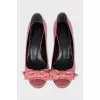 Patent leather shoes with a bow and open toe