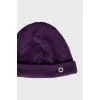 Knitted hat in purple color