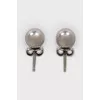 Silver earrings in the shape of spheres
