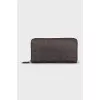 Brown wallet with signature print