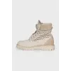 Leather lace-up boots with perforations