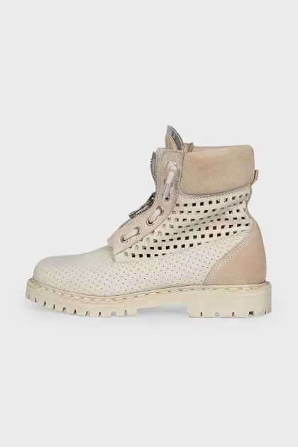 Leather lace-up boots with perforations