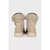 Leather lace-up boots with perforations