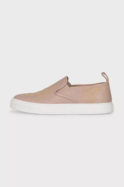 Leather slip-ons with gold-tone decor