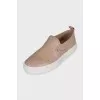 Leather slip-ons with gold-tone decor