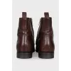 Men's brown boots with perforations