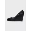 Black leather wedge shoes