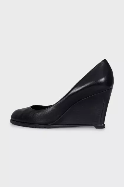 Black leather wedge shoes