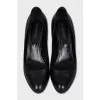 Black leather wedge shoes