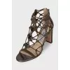 Leather heeled sandals with a braided upper