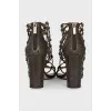 Leather heeled sandals with a braided upper