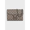 A Dionysus bag  in the signature print