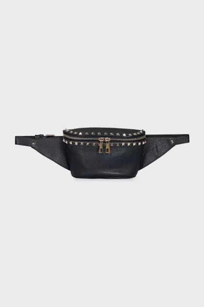 Leather belt bag decorated with studs