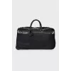 Black textile suitcase