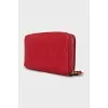 Red wallet with branded embossing