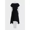 Fitted dress with decorative buttons