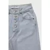 High-waisted jeans with buttons