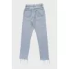 High-waisted jeans with buttons