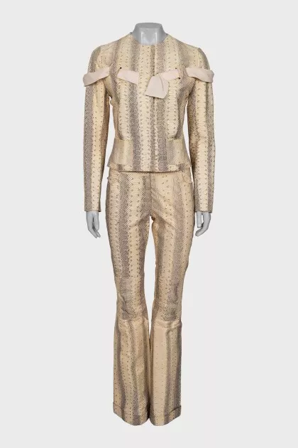 Suit with snakeskin trousers