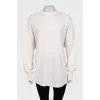 White long sleeve with a signature print