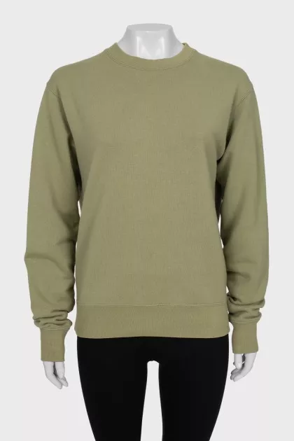Green sweatshirt with a signature print