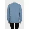 Blue sweatshirt with embroidery