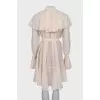 Dress with ruffles and tassels