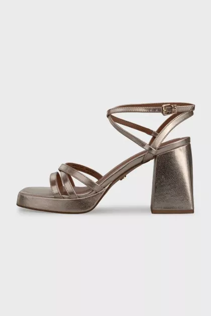 Gold-color trapeze heel sandals