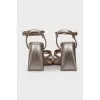 Gold-color trapeze heel sandals