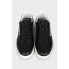 Black leather sneakers