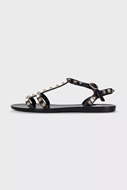Sandals decorated with golden spikes