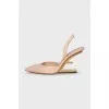 Leather slingbacks with a shaped heel