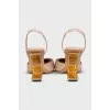 Leather slingbacks with a shaped heel