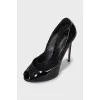 Black patent leather open-toe shoes