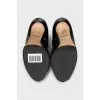 Black patent leather open-toe shoes