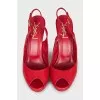 Red leather sandals with a figured heel