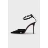 Patent leather shoes decorated with crystals