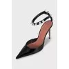 Patent leather shoes decorated with crystals