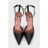 Patent leather shoes decorated with crystals