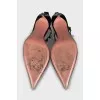 Patent leather shoes decorated with crystals
