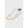 Leather sneakers with signature embroidery