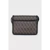 Brown leather bag with monogram