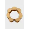 A chunky gold bracelet with a tag