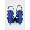 Blue leather sandals with braided pattern