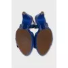 Blue leather sandals with braided pattern