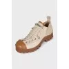 Leather and suede sneakers with a contrasting sole