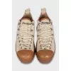 Leather and suede sneakers with a contrasting sole