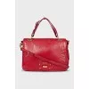 Leather bag with gold clasp